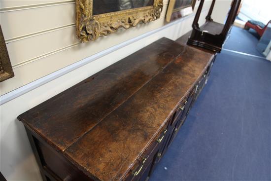 A mid 18th century oak dresser base, W.4ft 11in. D.1ft 10in. H.2ft 10in.